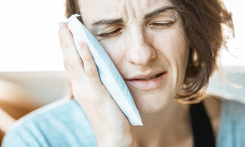 Tooth Sensitivity: Symptoms, Causes, and Treatment background image