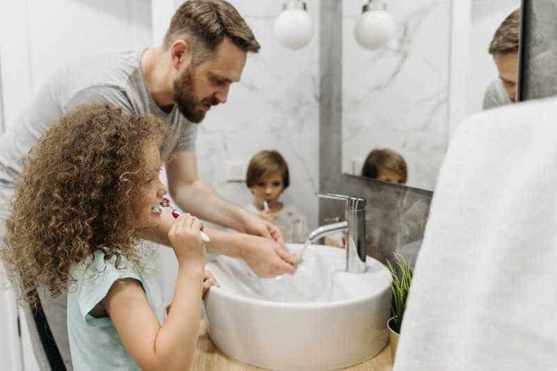 What Happens If You Only Brush Your Teeth Once a Day?  background image